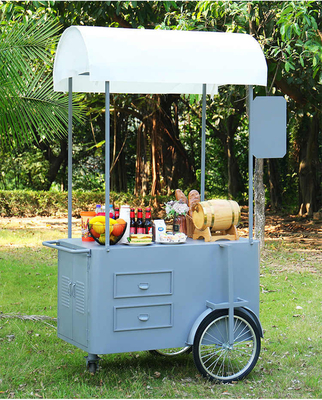 カスタマイズされたロゴサイズ 携帯食品カート ビジネス 自動販売用の手押しカート コーヒー・キャンディーズ アイスクリームカート