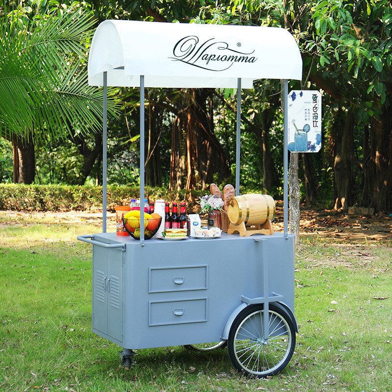 カスタマイズされたロゴサイズ 携帯食品カート ビジネス 自動販売用の手押しカート コーヒー・キャンディーズ アイスクリームカート